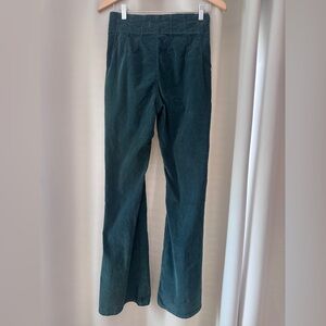 Dark Green Flare Pinwale Corduroy Jeans by We The Free